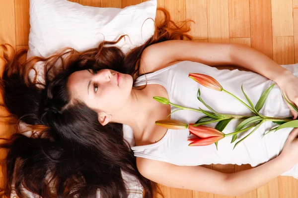 Young woman with lily — Stock Photo, Image